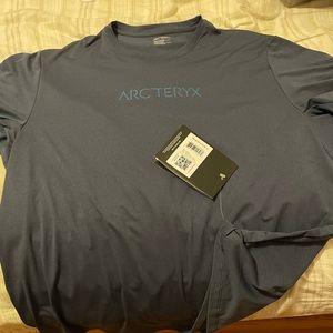 ARC’TERYX Remige Word T shirt. Tags on. Brand new.